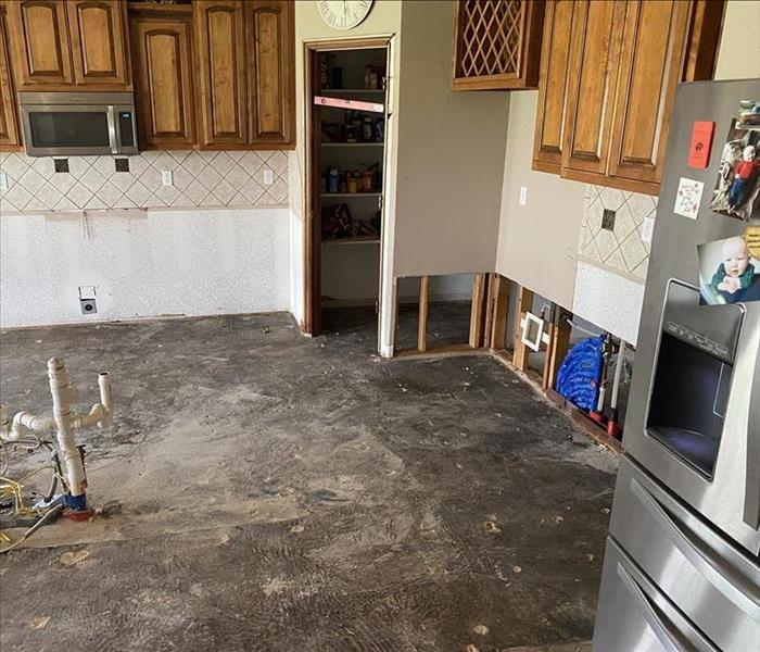 white kitchen walls with cabinets and floor removed