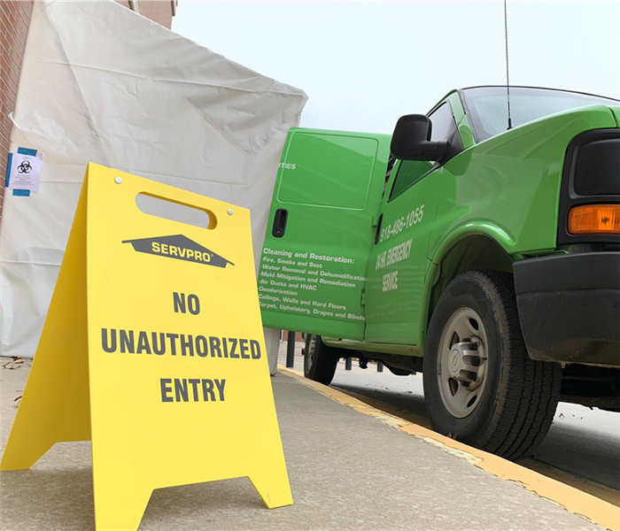 Our team's SERVPRO van at the front of a job